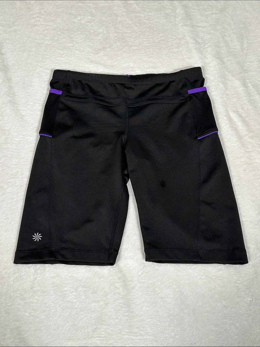 Athleta Black Presto Bermuda compression shorts with Purple Accent